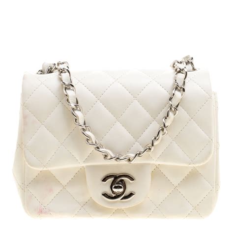 small brown chanel bag|white quilted chanel bag.